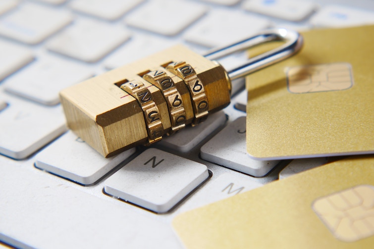 Combination lock lying on a computer keyboard